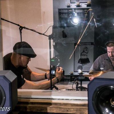 Luis Vega getting shots of Aaron Comess in the studio